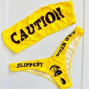 Dolls Kill Yellow Caution Slippery When Wet Bandeau High Leg Bikini Set